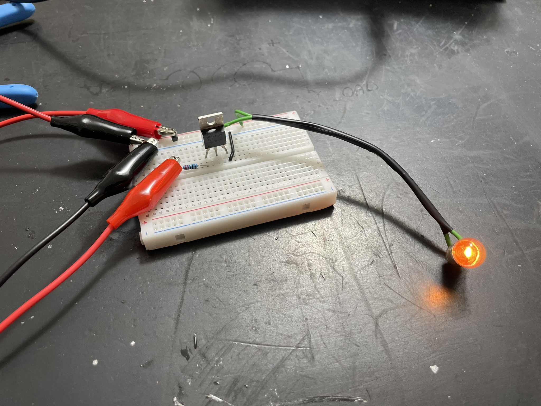 Breadboard circuit with 20 Ohm resistor for safe PWM input control of three LEDs in sequence