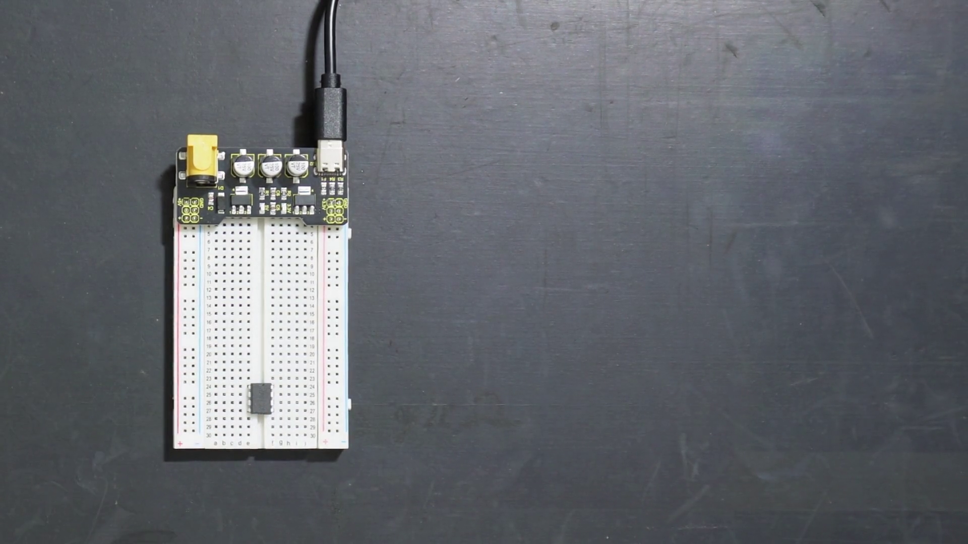 Prototyping breadboard with power-supply and LM358 Op-Amp.