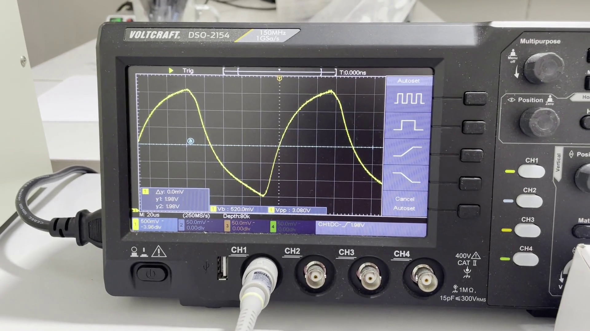 Oscilloscope showing an almost perfect triangle wave signal coming from an oscillator circuit.