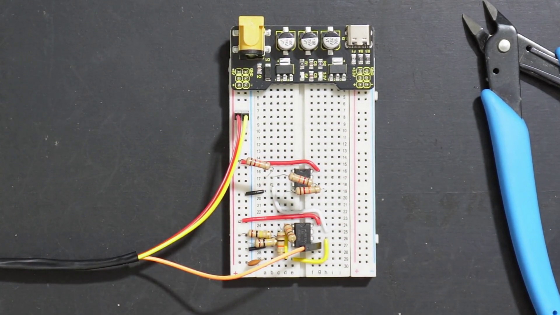 First op-amp connected to second for dual PWM generating circuit on a breadboard.