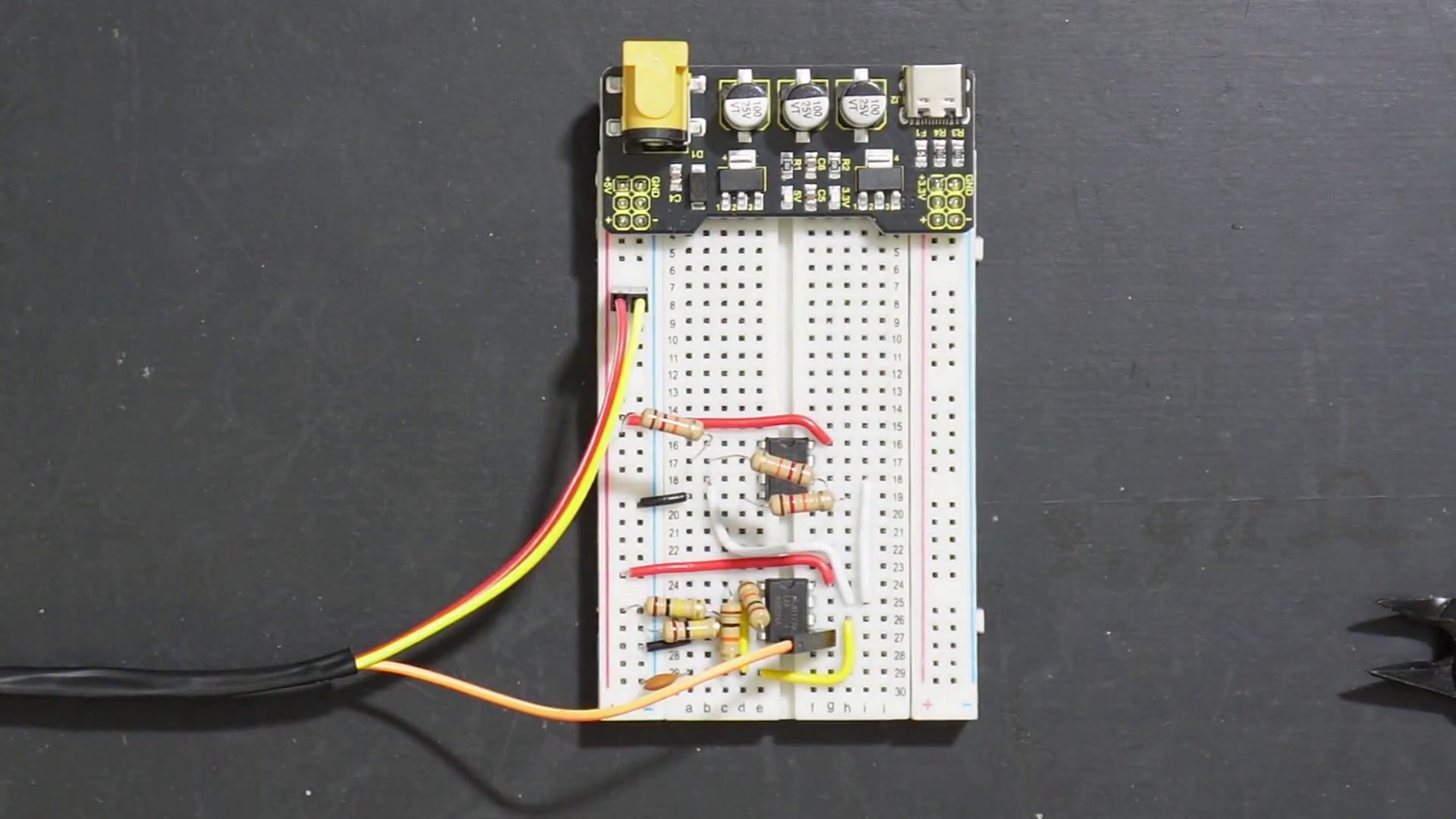 First op-amp connected to second for dual PWM generating circuit on a breadboard.