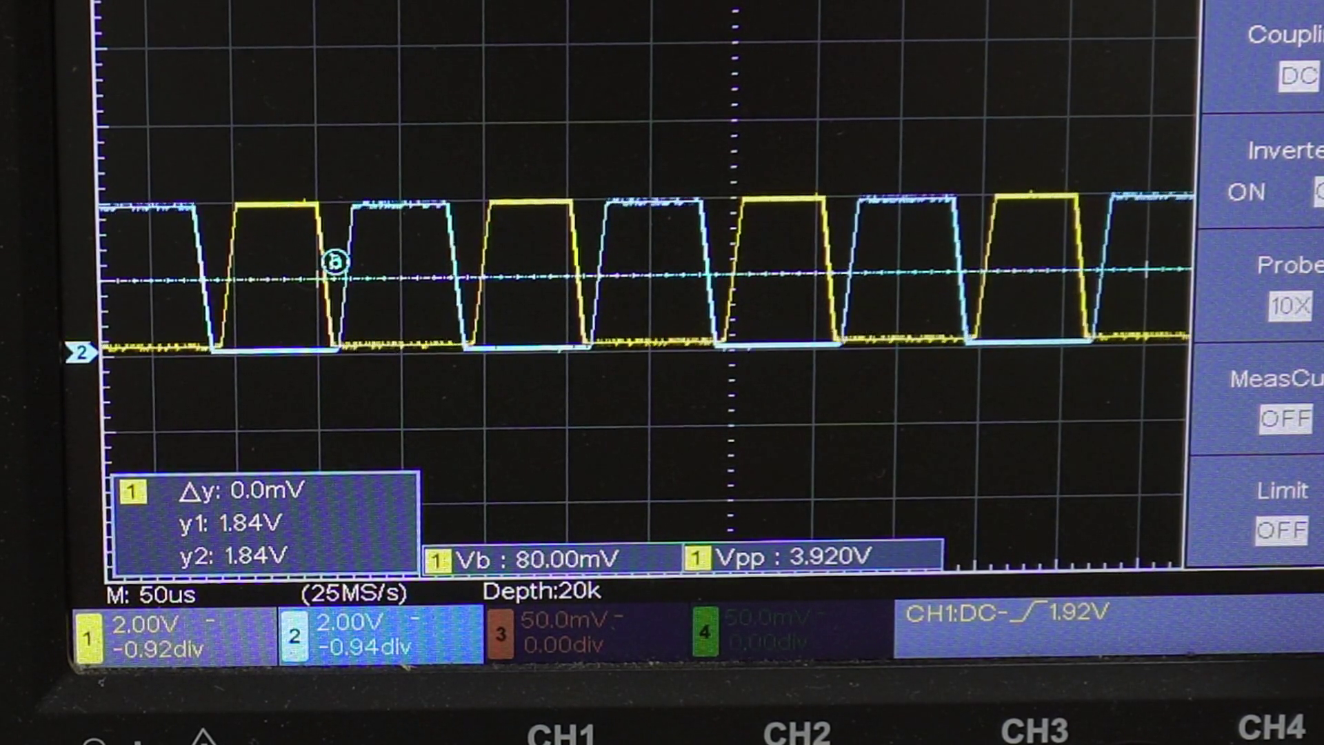 Oscilloscope showing two non-overlapping PWM signals from dual-PWM signal generator circuit using LM358 Op-Amps on breadboard.